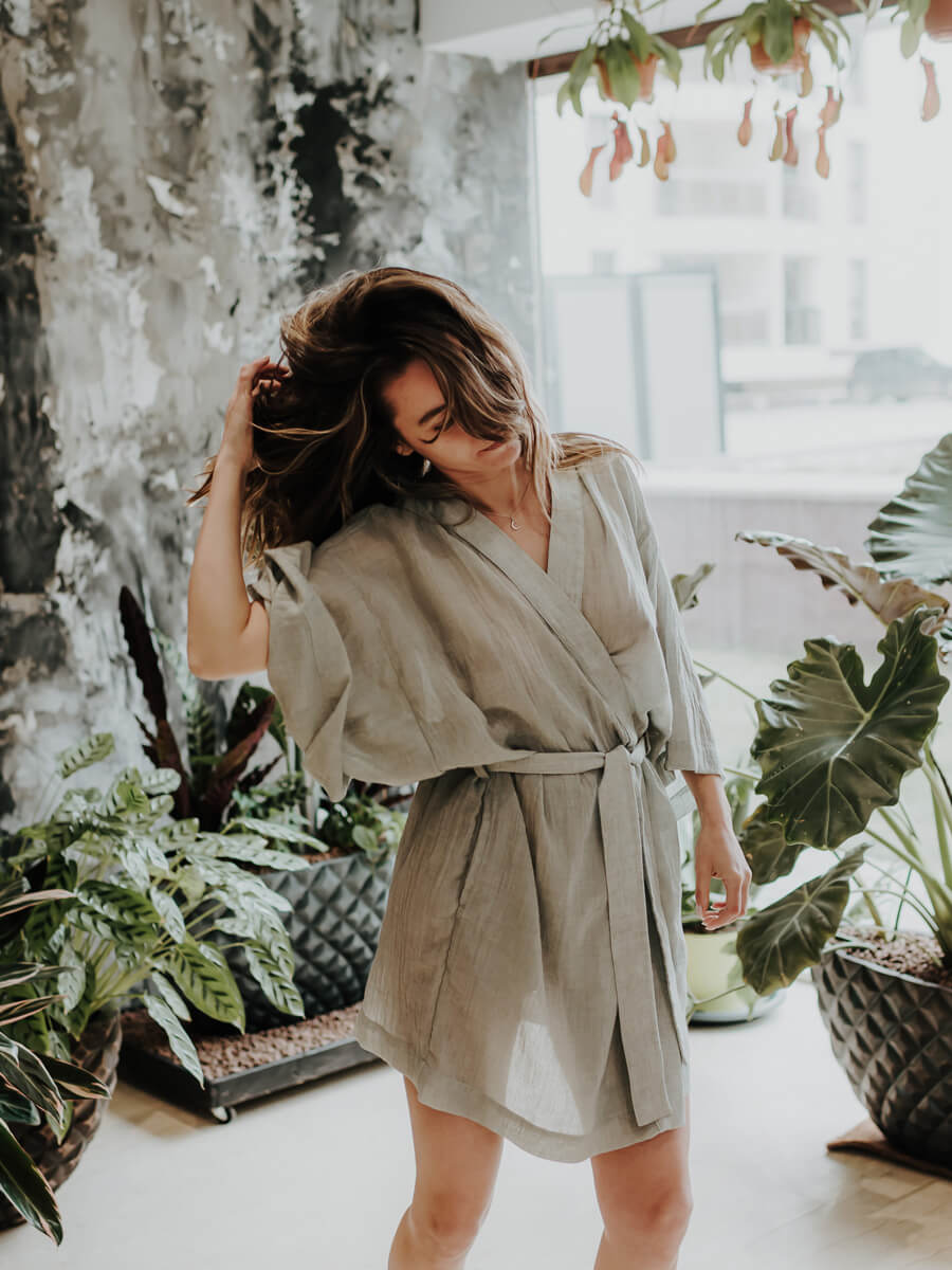 Woman in room with long dark hair wearing Ceva Cu Dichis kimono
