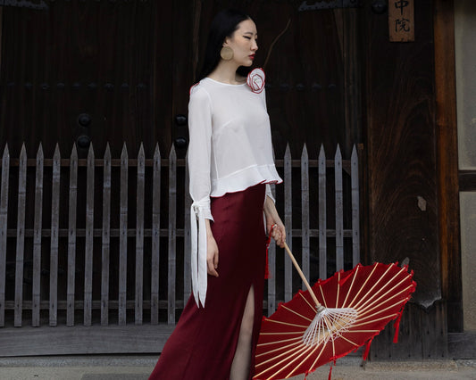 Blouse with frills