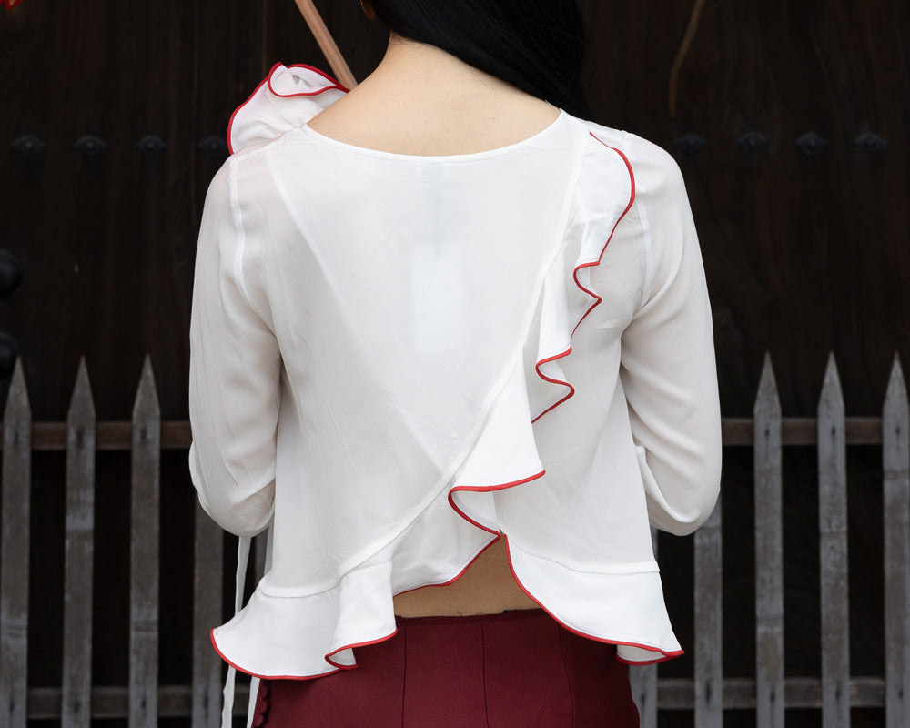 Blouse with frills