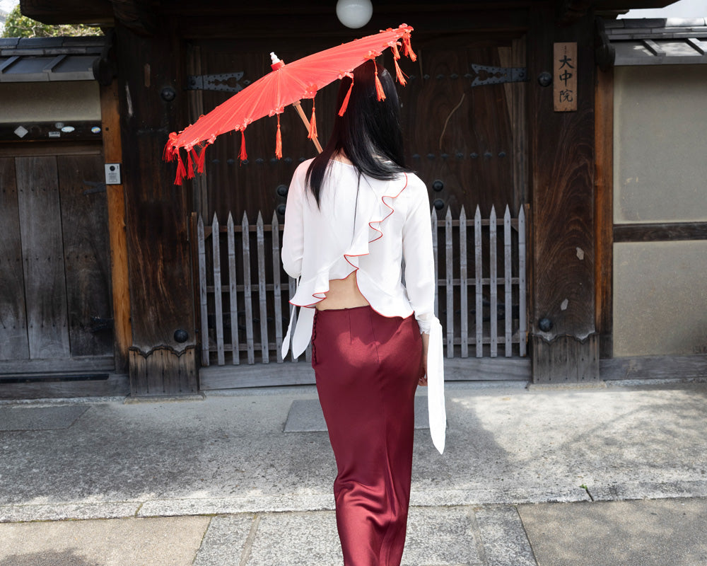 Blouse with frills